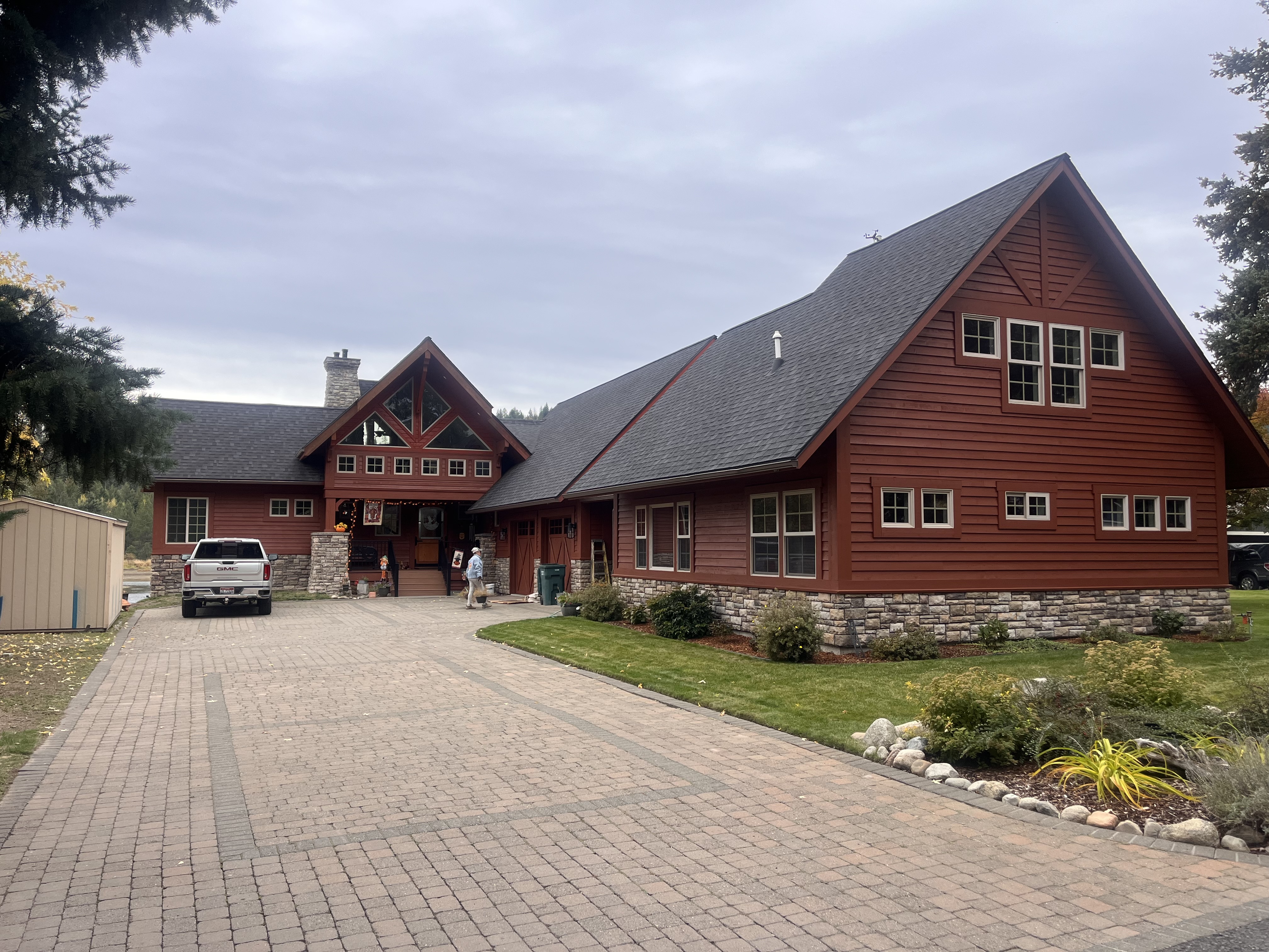 Log home side with American flag art